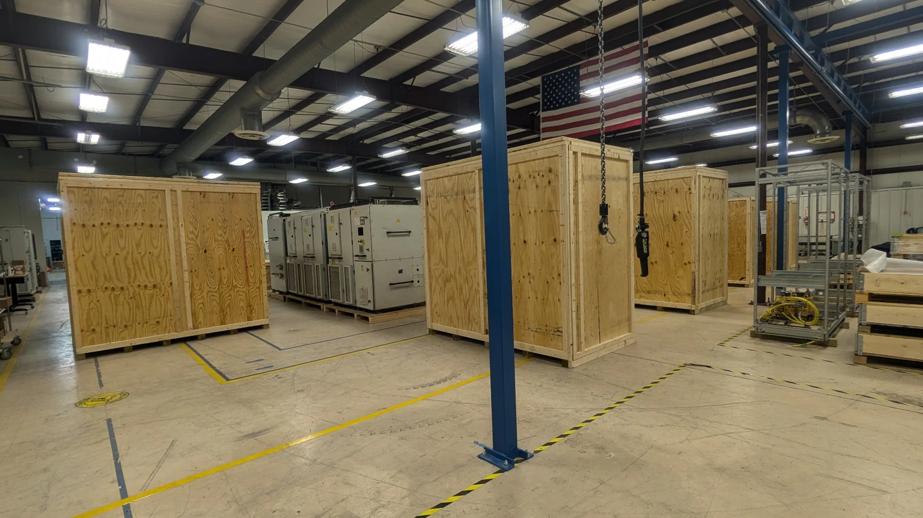 Industrial crating shop with custom wood crates and American flag
